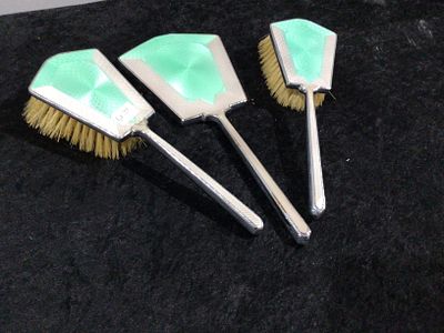 An Art Deco English Three-Piece Chrome and Green Guilloche Enamel Dressing Table Set. An Art 