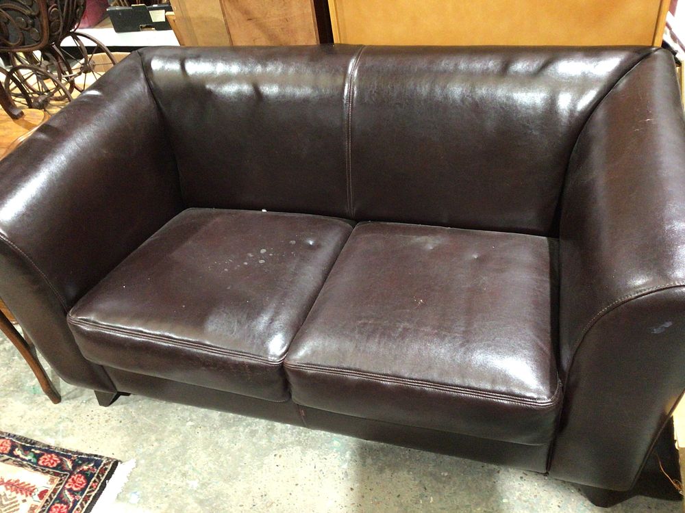 Lot 201: A Modern Dark Brown Leather or Faux Leather Loveseat