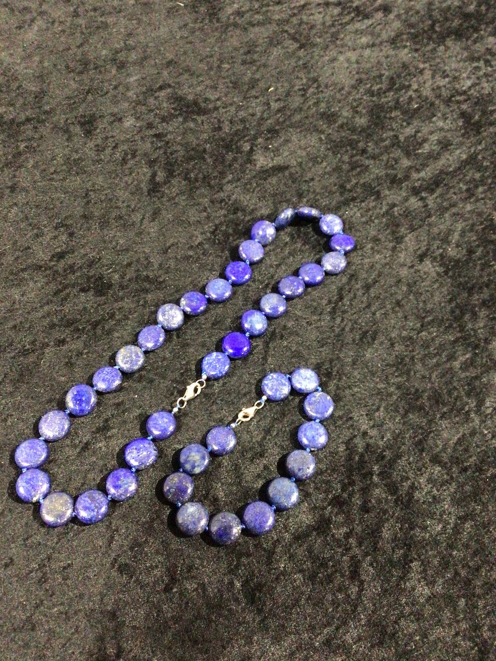 Lot 330: A Silver and Lapis Lazuli Necklace and Bracelet Set