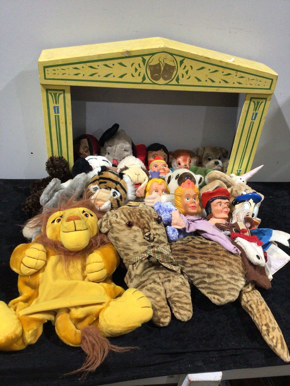Lot 414: A Collection of Mid-to-Late 20th Century Hand Puppets and Plush Toys with a Wooden Puppet Stage