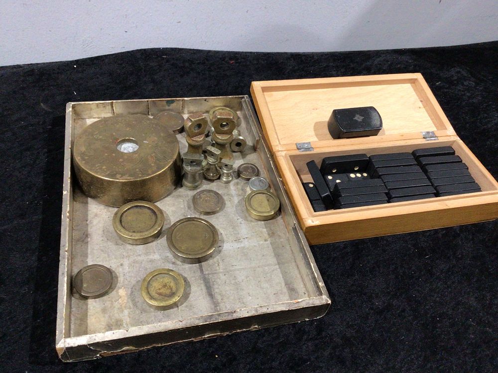Lot 447: A Collection of Brass Scale Weights and a Set of Dominoes