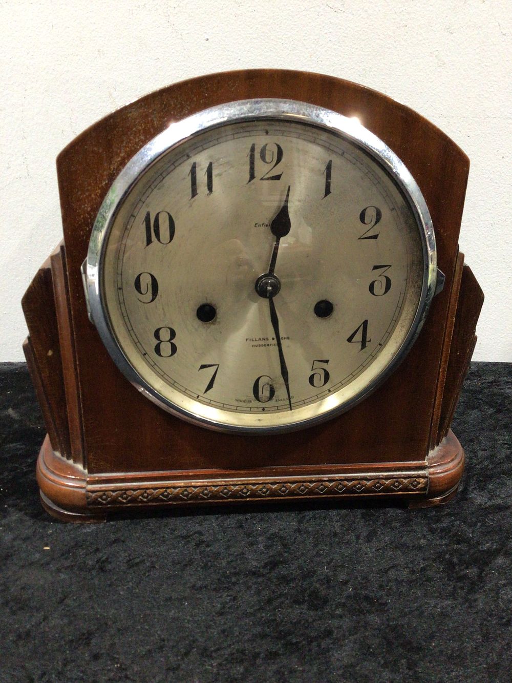 Lot 456: An Art Deco Style Enfield Wooden Cased Mantel Clock, retailed by Fillans & Sons Huddersfield, Made in England