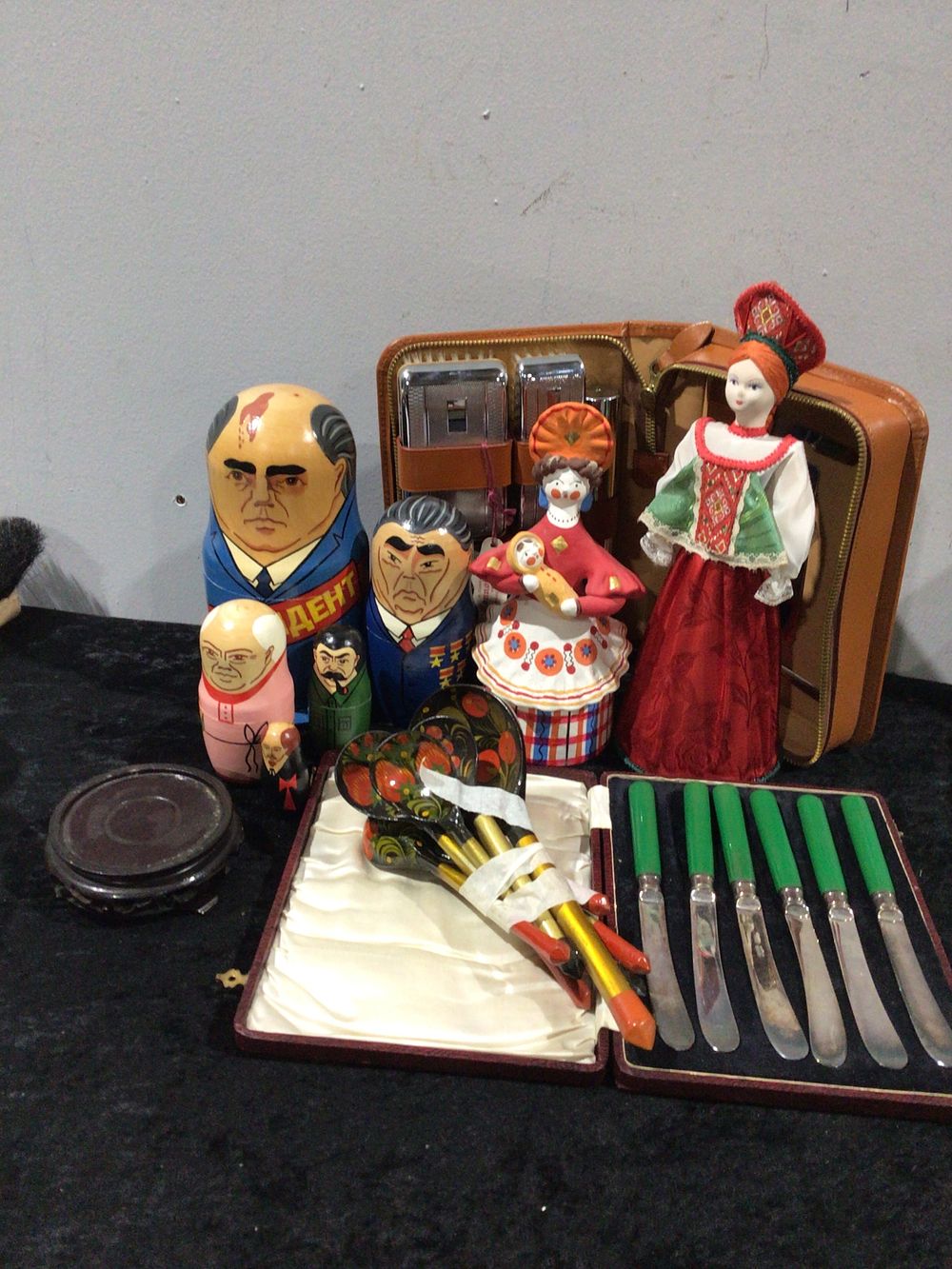 Lot 462: A Collection of Russian Folk Art Dolls and Souvenirs, together with a Vanity Case and a Cased Set of Knives