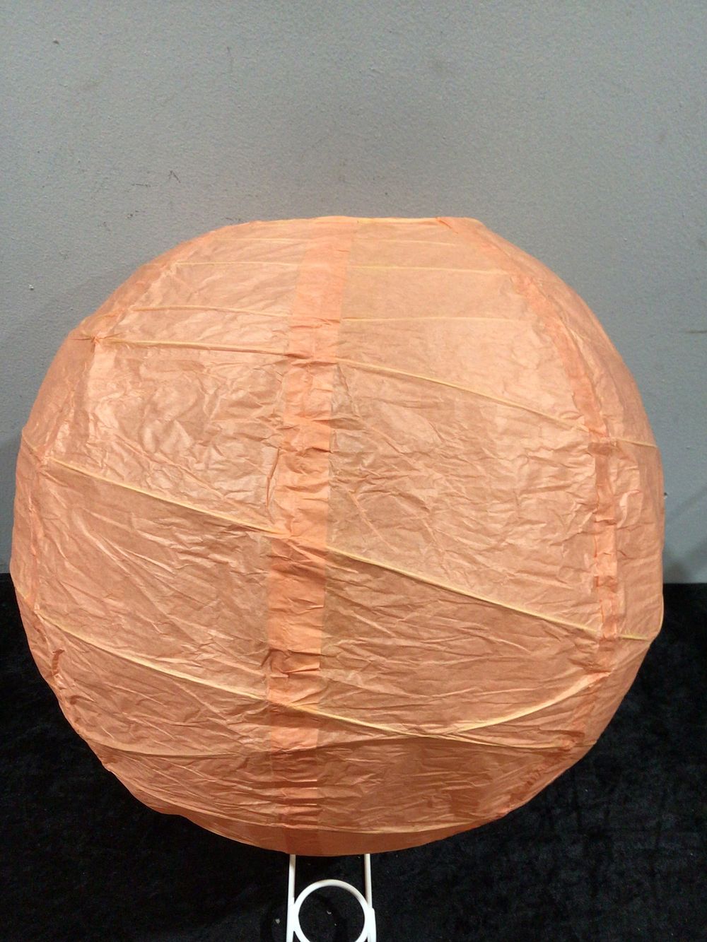Lot 157: A Set of 50 Peach 14 Inch Round Paper Lanterns
