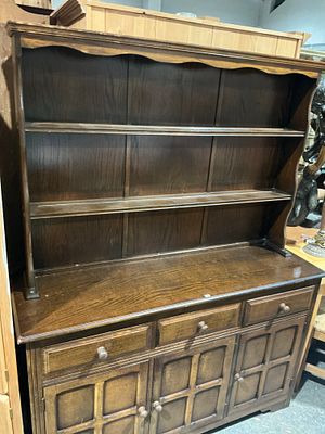 A Dark-Stained Oak Welsh Dresser in the English Country Style. A large, two-part piece of 