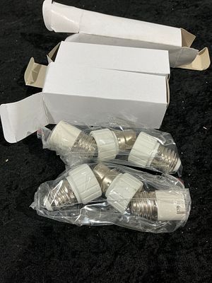 A Collection of 60 E27 to GU10 Lamp Socket Adapters. A collection of sixty electrical lamp 
