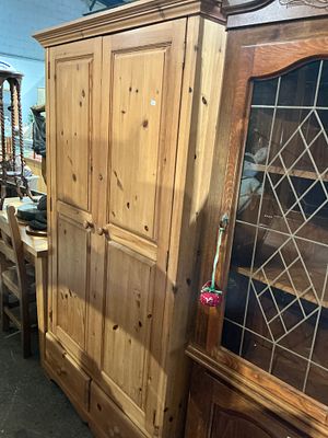A Knotty Pine Double Wardrobe and Hardwood Display Cabinet. A pair of rustic style furniture 