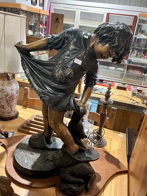 A Large Patinated Bronze Figural Sculpture of a Young Girl and Dog teddy. A single large figural 