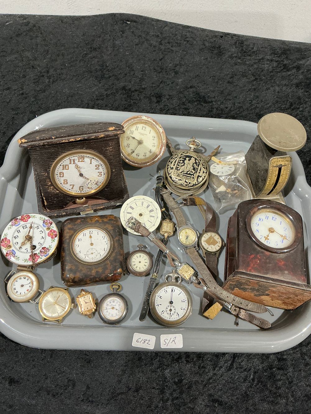 Lot 151: A Collection of 20 Vintage Watches, Clocks, and Horological Items for Spares or Repairs