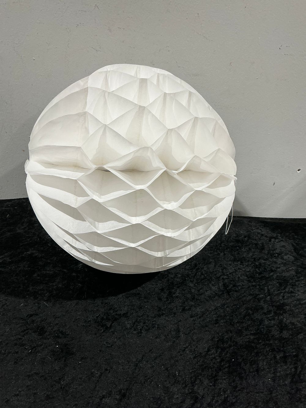 Lot 181: A Collection of 400 White Paper Honeycomb Ball Decorations