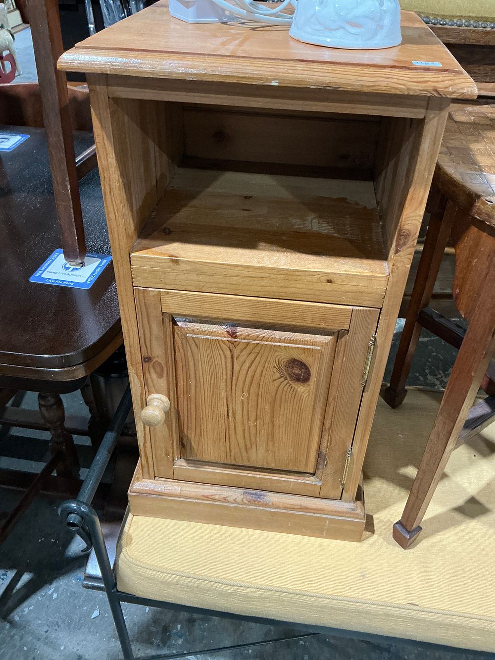 Lot 245: A Single Rustic Knotty Pine Bedside Cabinet or Nightstand