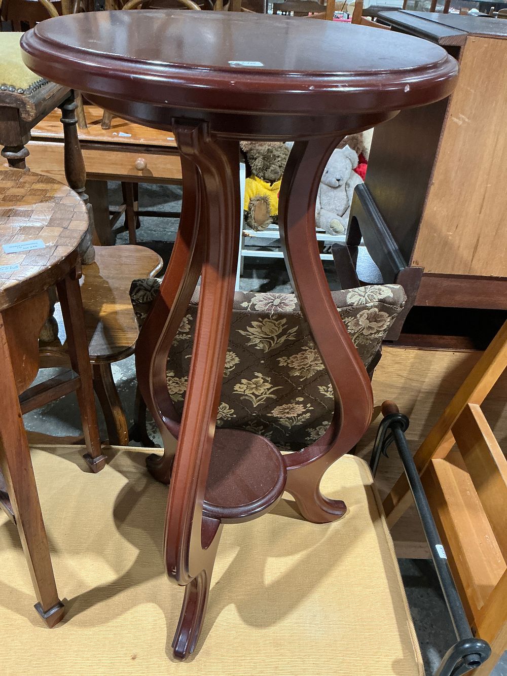 Lot 247: A Modern Dark-Stained Wooden Two-Tier Accent Table