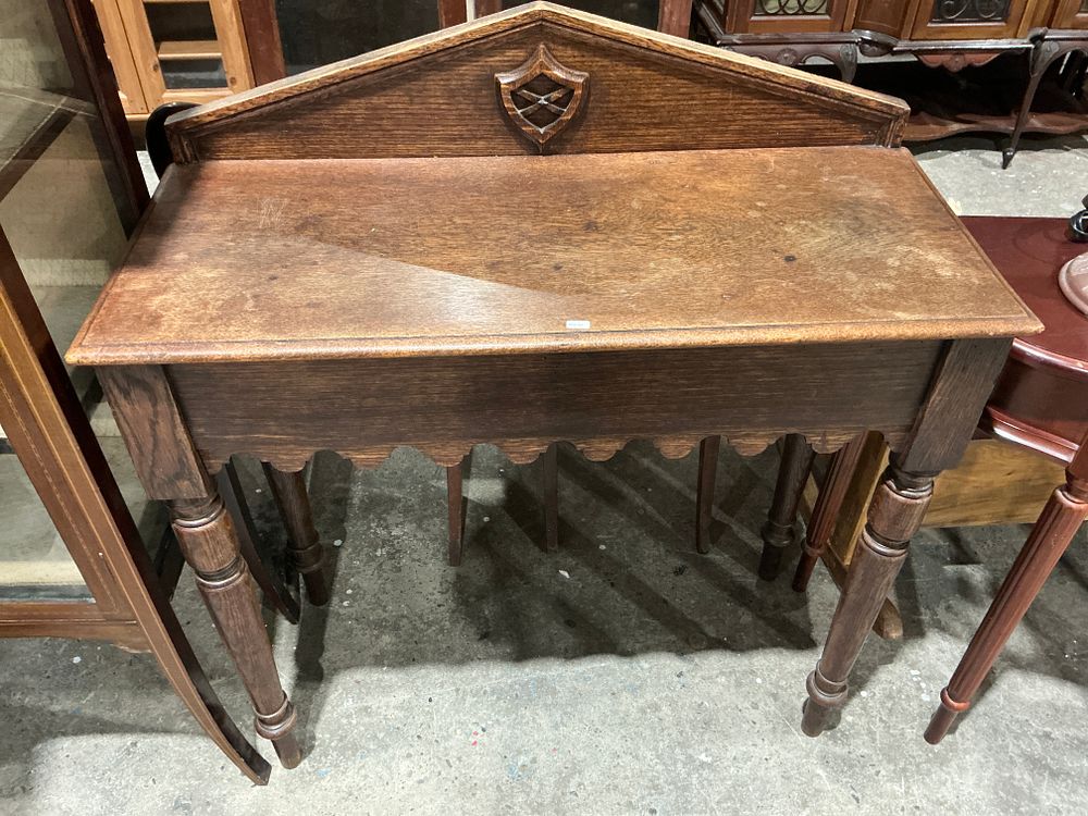 Lot 257: A Late Victorian Gothic Revival Oak Console Table