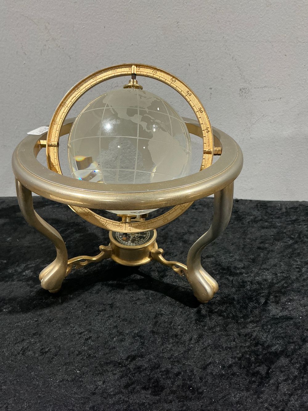 Lot 272: A Neo-Classical Style Glass and Brass Desktop Globe with Integrated Compass