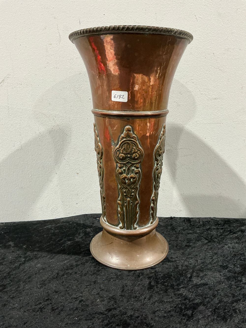 Lot 275: A Tibetan Copper and Yellow Metal Dungchen Trumpet Repurposed as a Vase with small hole in base