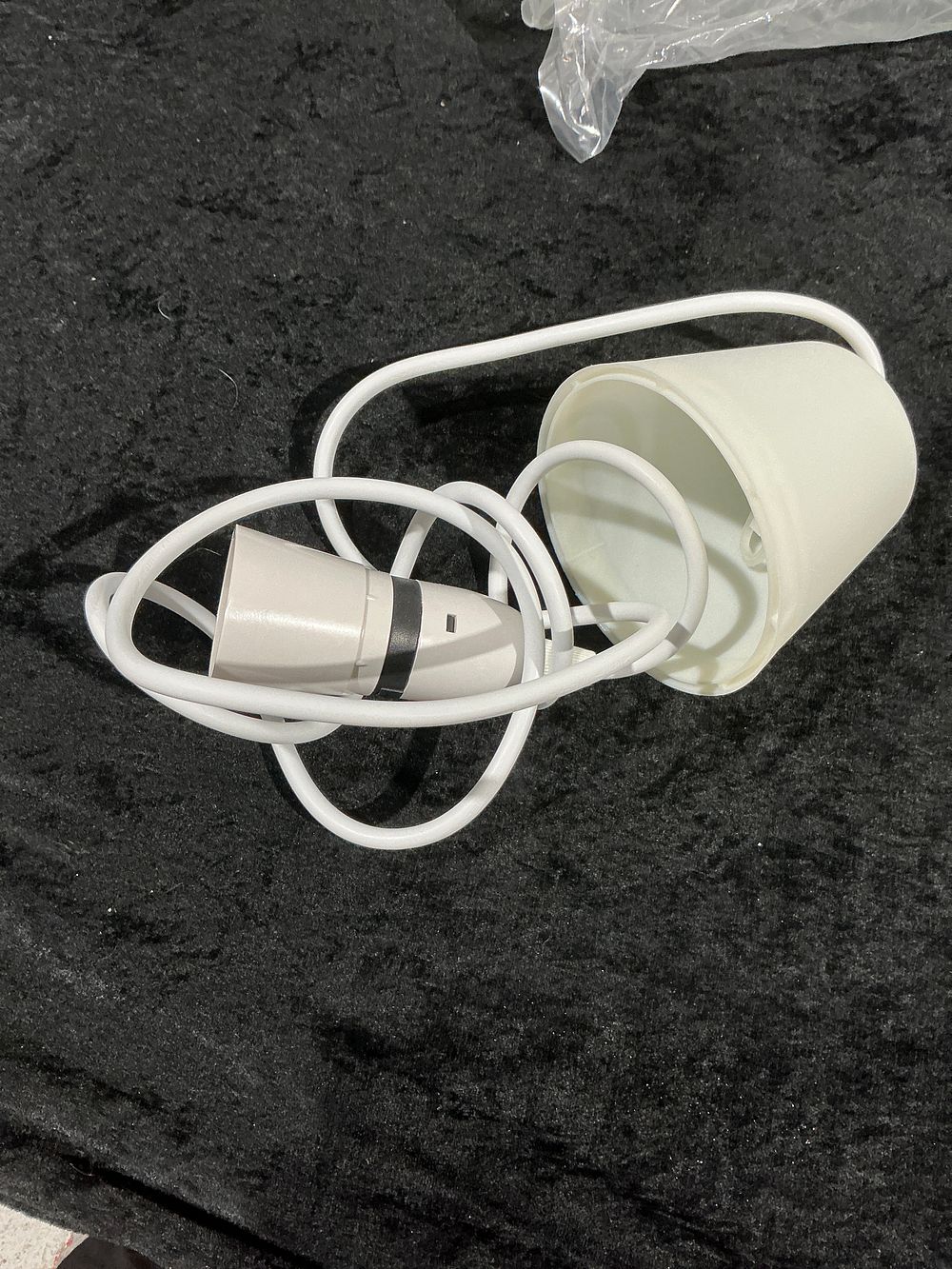 Lot 287: A Collection of 50 Contemporary White Plastic Pendant Light Fittings