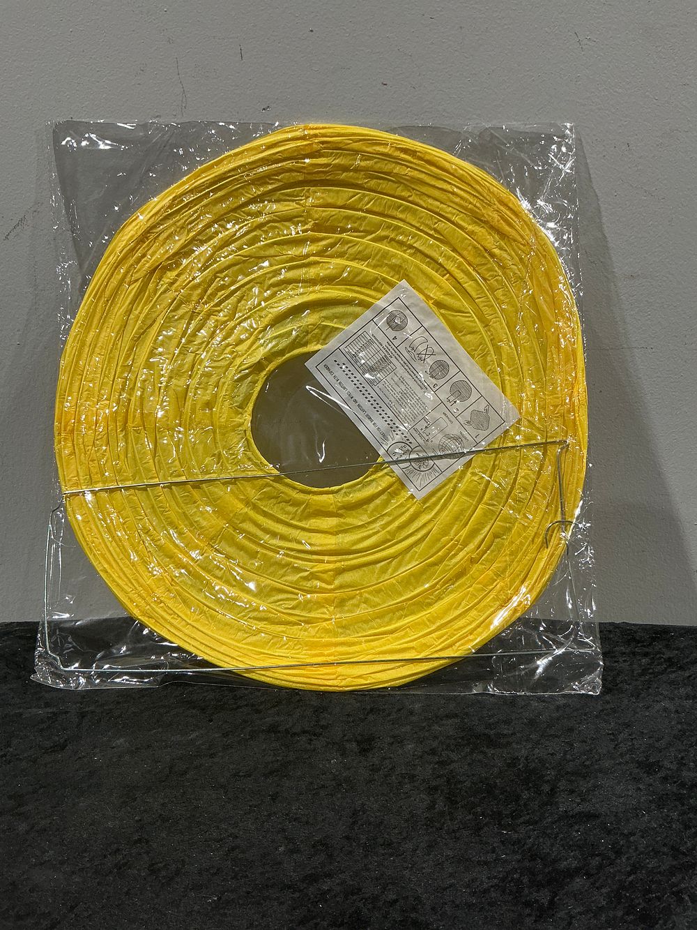 Lot 294: A Collection of 100 Yellow Paper Lantern Light Shades