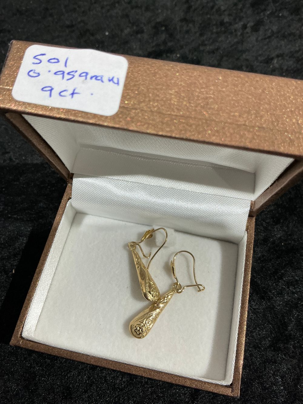 Lot 340: A Pair of 9ct Gold Patterned Teardrop Drop Earrings