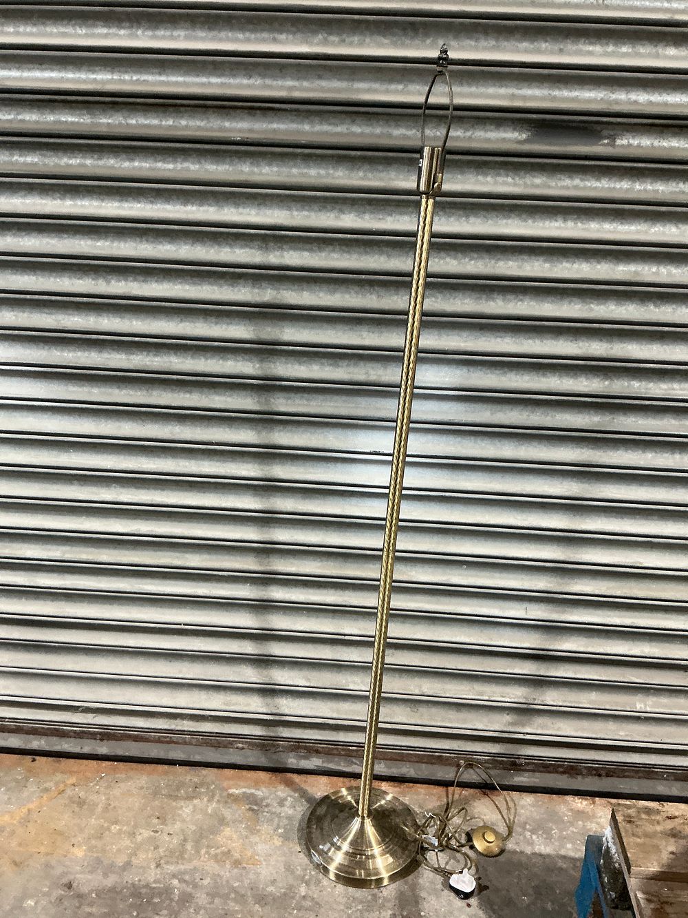 Lot 367: A Brass-Toned Floor Lamp with Twisted Stem