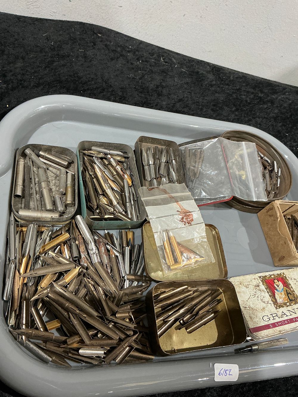 Lot 415: A Collection of Approximately 250 Vintage Dip Pen Nibs and Assorted Tins