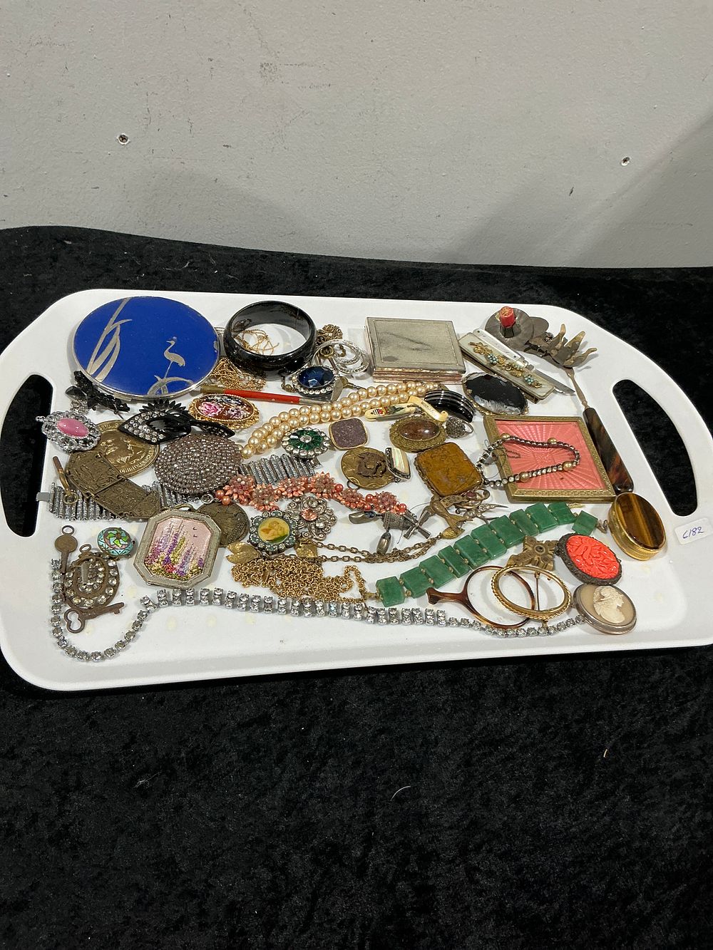 Lot 426: A Collection of 45 Vintage and Mid-Century Costume Jewelry Items and Vanity Accessories