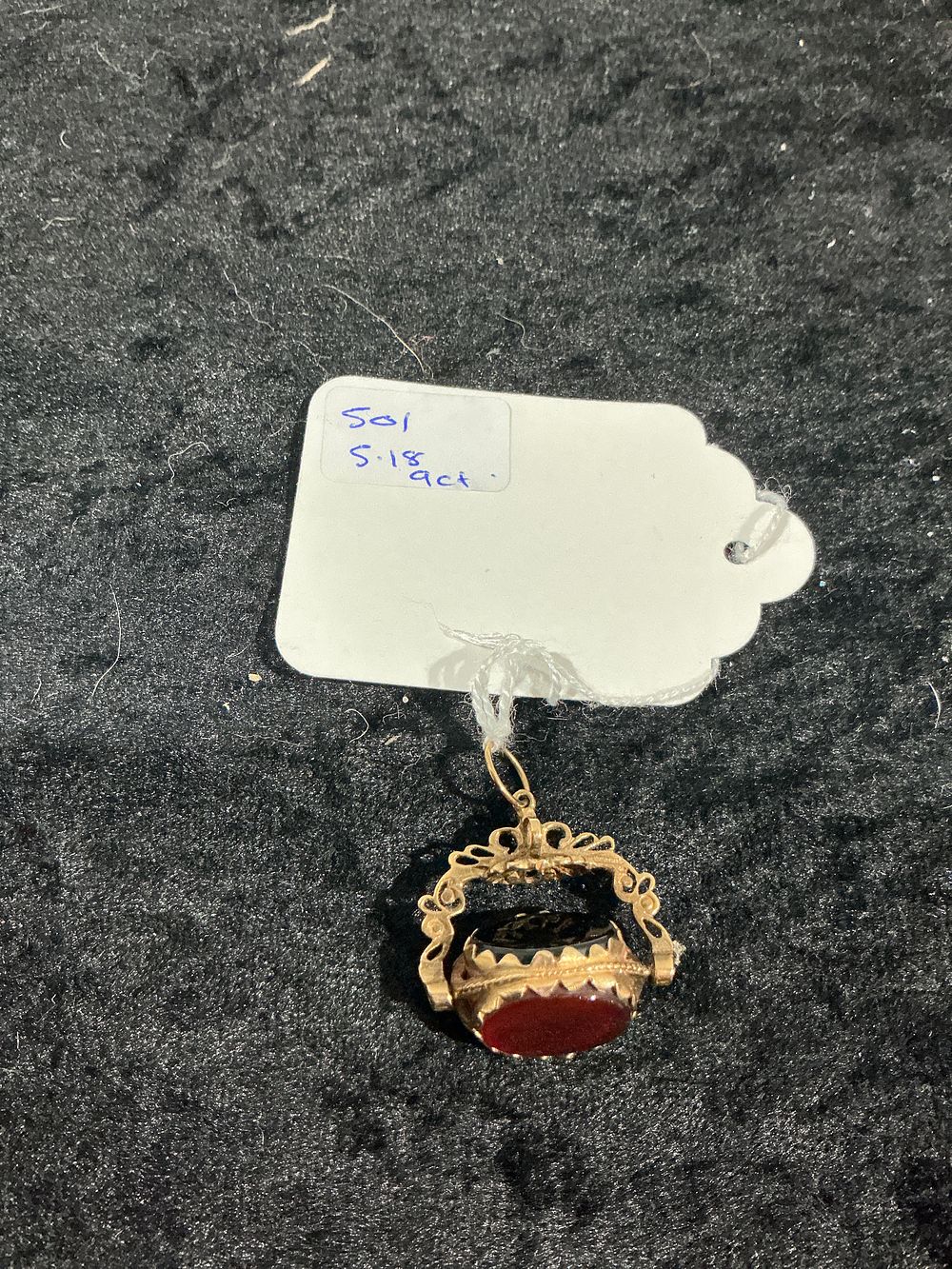 Lot 437: 9ct Gold and Gem Inset Spinning Watch Fob Pendant