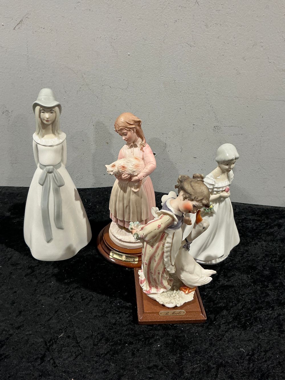 Lot 447: A Collection of Four spanish Porcelain Figural Groups