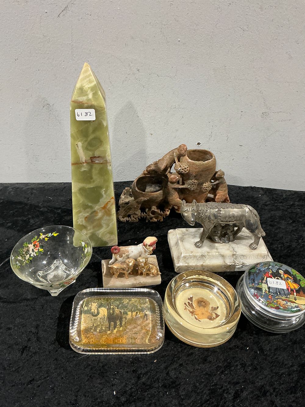 Lot 474: A Collection of 8 Decorative Objects Including a Green Onyx Obelisk and Capitoline Wolf Sculpture