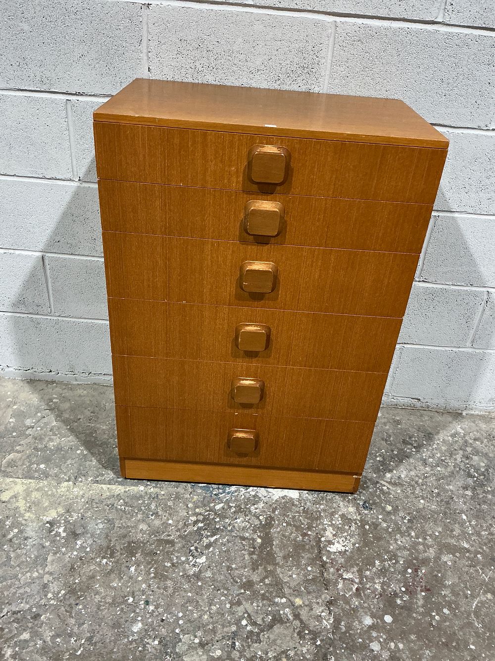 Lot 4: A Mid-Century Modern Danish Teak Five-Drawer Tall Boy Chest
