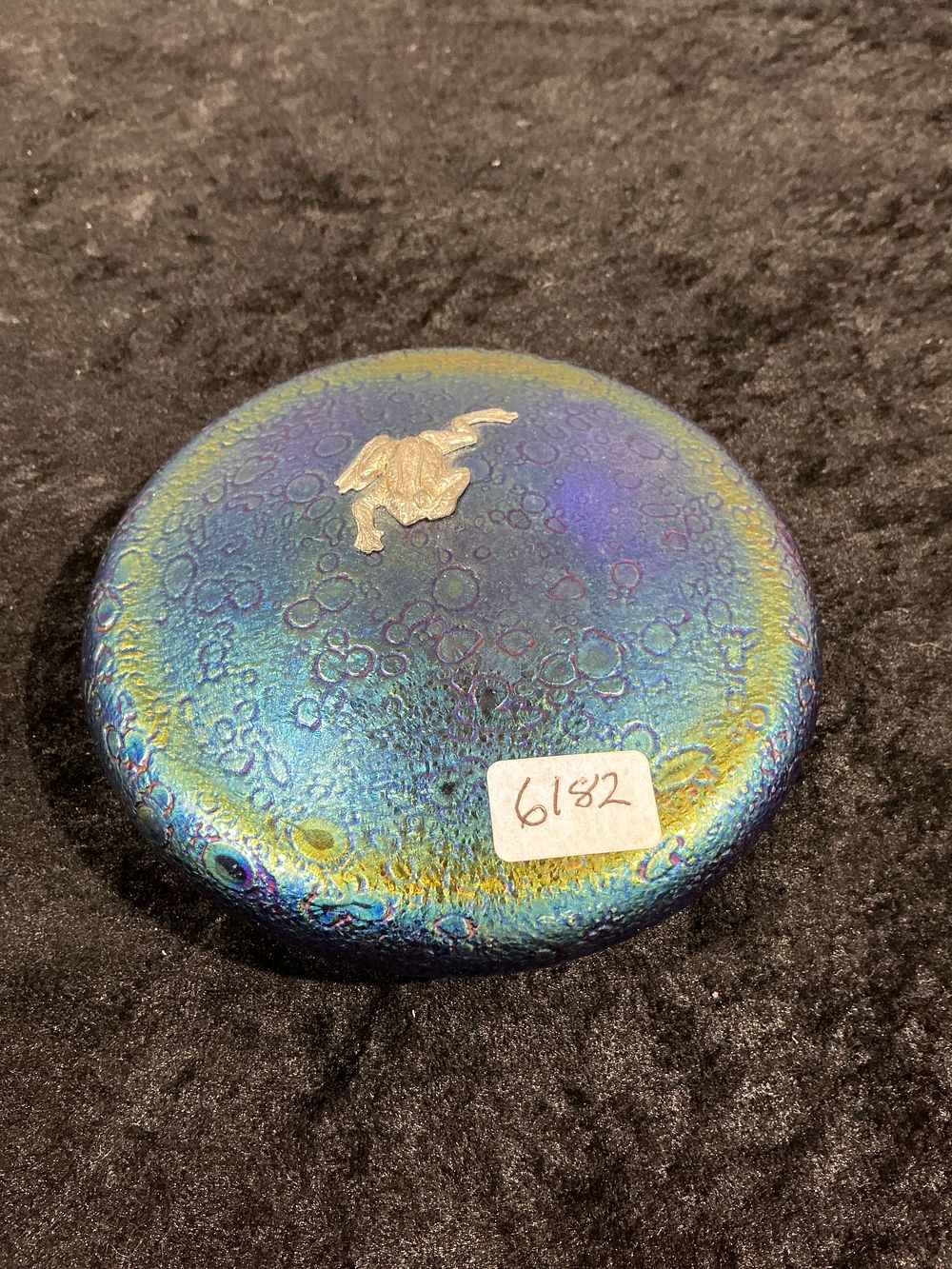Lot 179: A Heron Glass Iridescent Frog on Lily Pad Paperweight