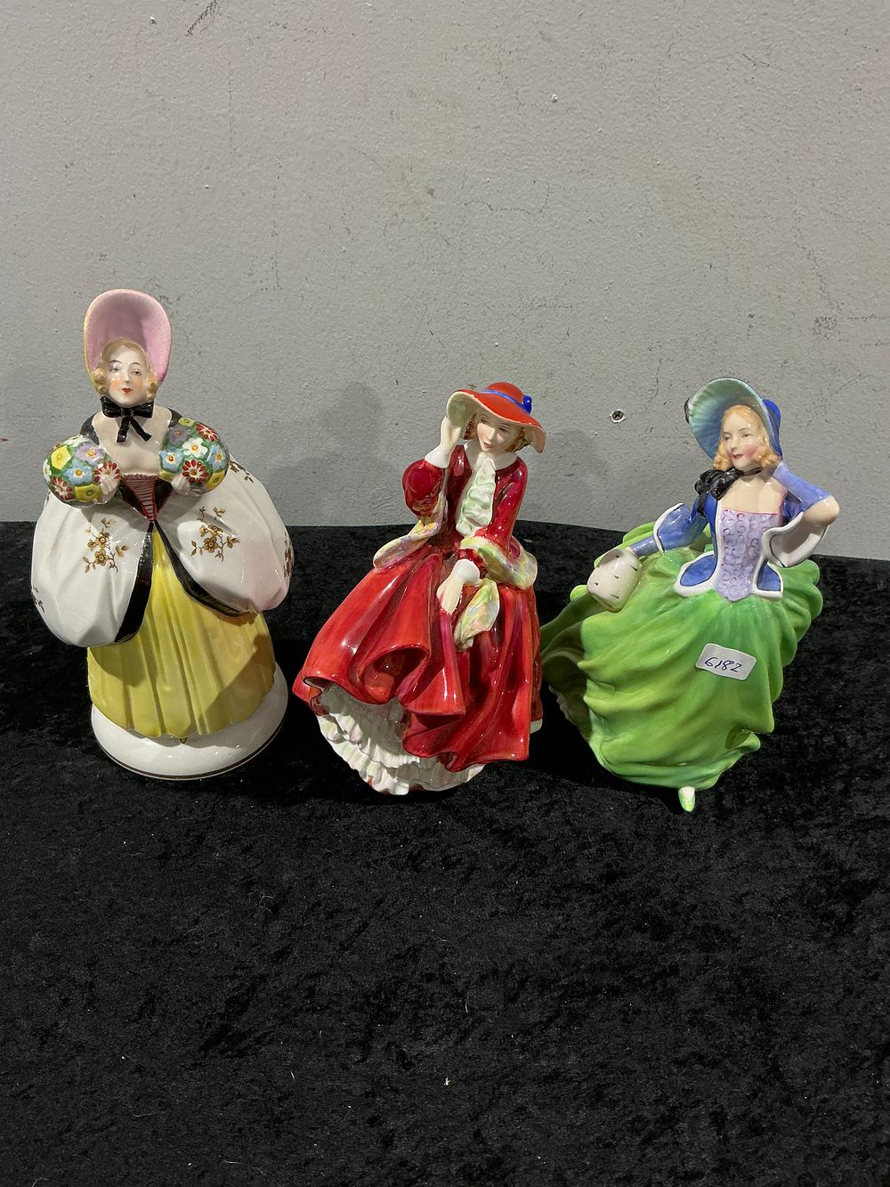 Lot 181: A Trio of Royal Doulton Porcelain Figurines