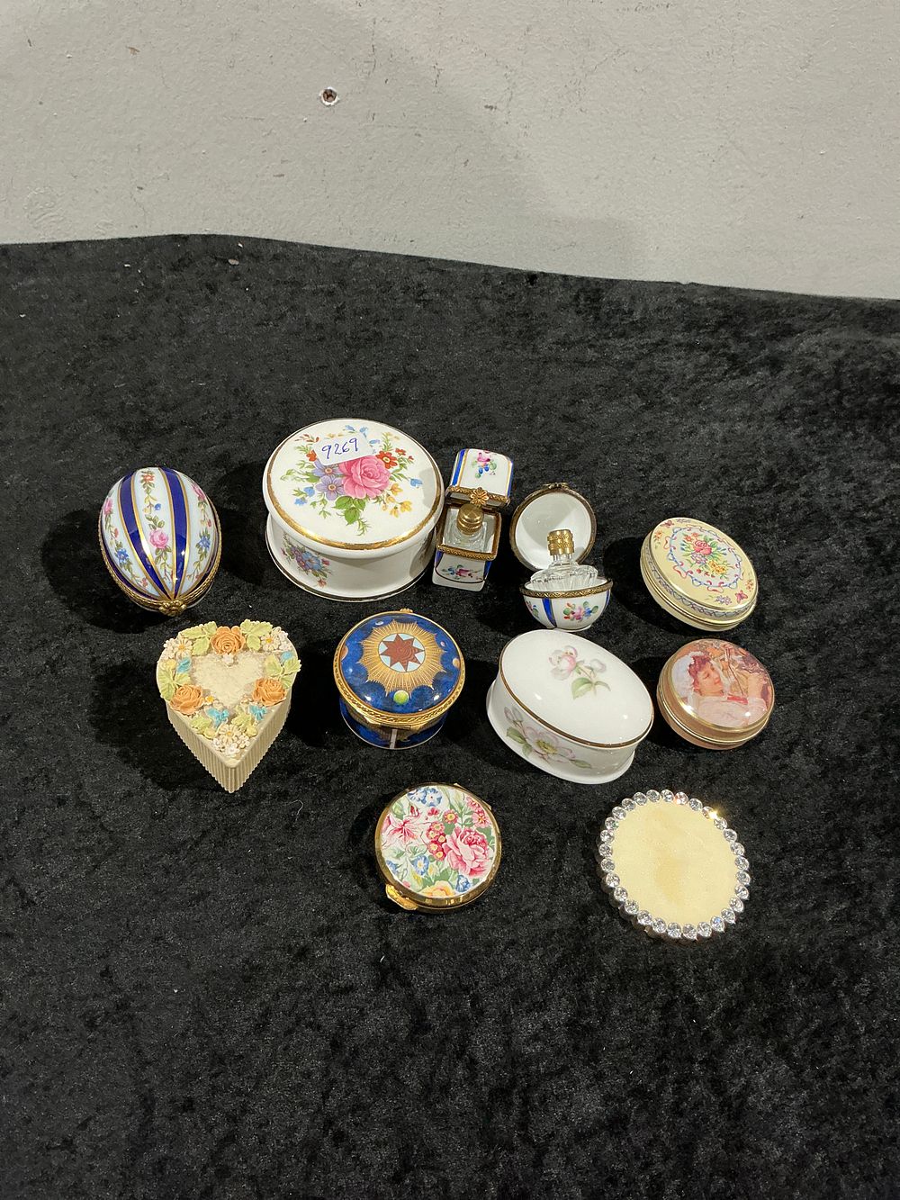Lot 215: A Collection of Decorative Porcelain Trinket Boxes and Scent Bottles