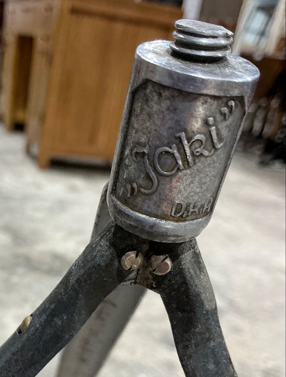 Lot 218: Two Items: A German Jaki Metal Tripod and a Wooden Walking Cane