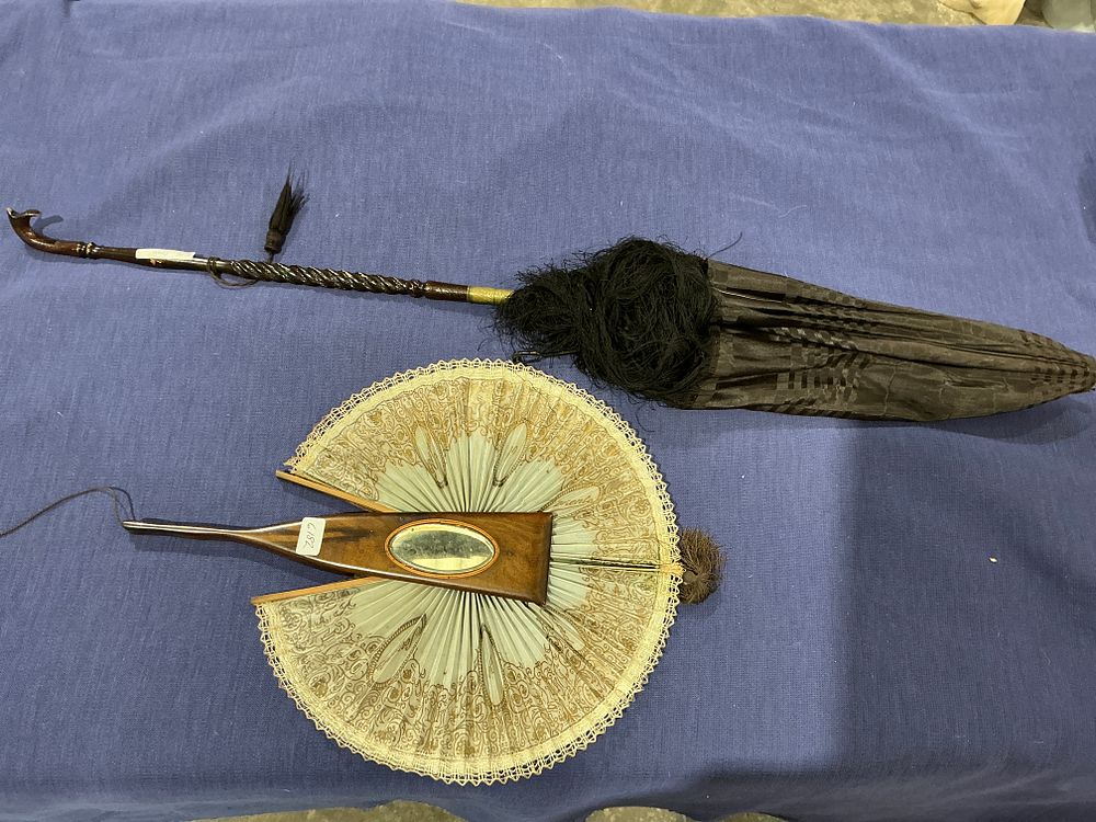 Lot 230: Two Antique Personal Accessories Including a Duvelleroy Paris Folding Fan and a Carved Wood Parasol
