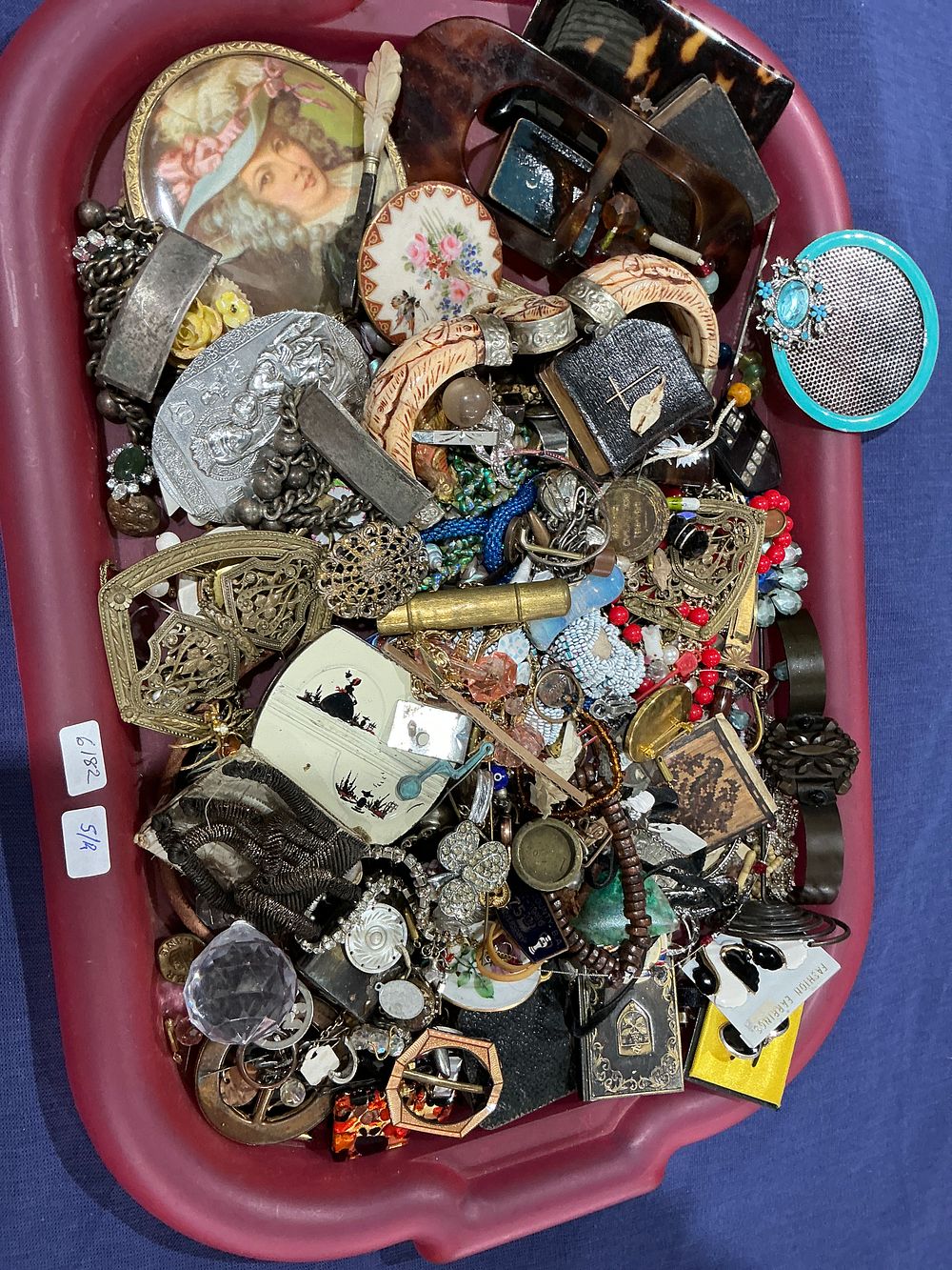 Lot 231: A Collection of Vintage and Contemporary Costume Jewelry and Personal Accessories in a Tray Containing Repair Items