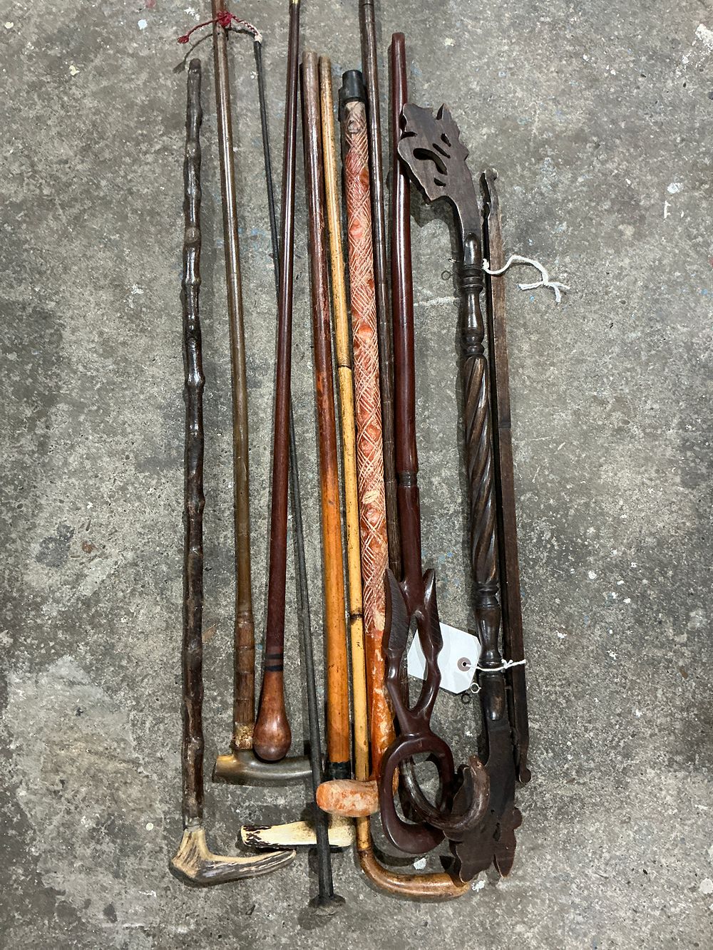 Lot 268: An East African Collection of Carved Wood Canes and Walking Sticks