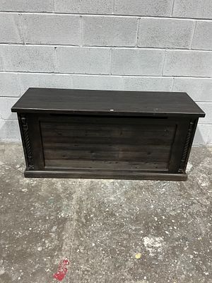 A Rustic Dark-Stained Pine Wooden Storage Trunk with Rope-Twist Carved Mouldings. A 