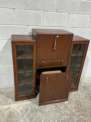 An Art Deco Mahogany Veneered Breakfront Secretary Bookcase with Matching Stool. This early to 