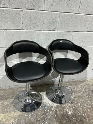 A Pair of Modern Chrome and Black Upholstered Bar Stools. A pair of contemporary pedestal bar 
