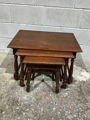 Early 20th Century Jacobean Revival Solid Oak Nest of Three Tables. A graduated nest of three 