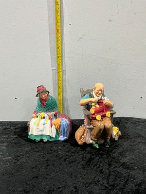 Royal Doulton, The Toymaker and Silks and Ribbons. A pair of Royal Doulton glazed porcelain bone 