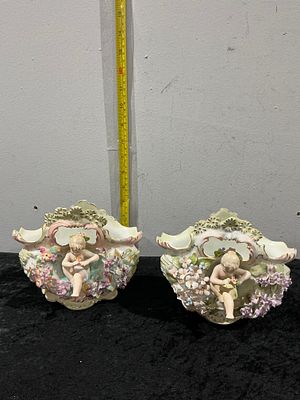 German Porcelain (Sitzendorf), Rococo-Style Cherub Wall Pockets, Model 7239. A fine pair of late 
