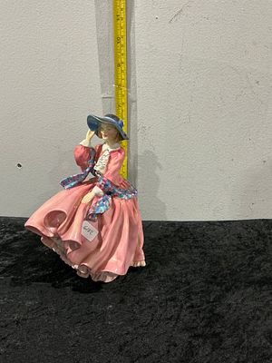 Royal Doulton, Top o' the Hill Figurine. A fine Royal Doulton glazed English bone china figurine 
