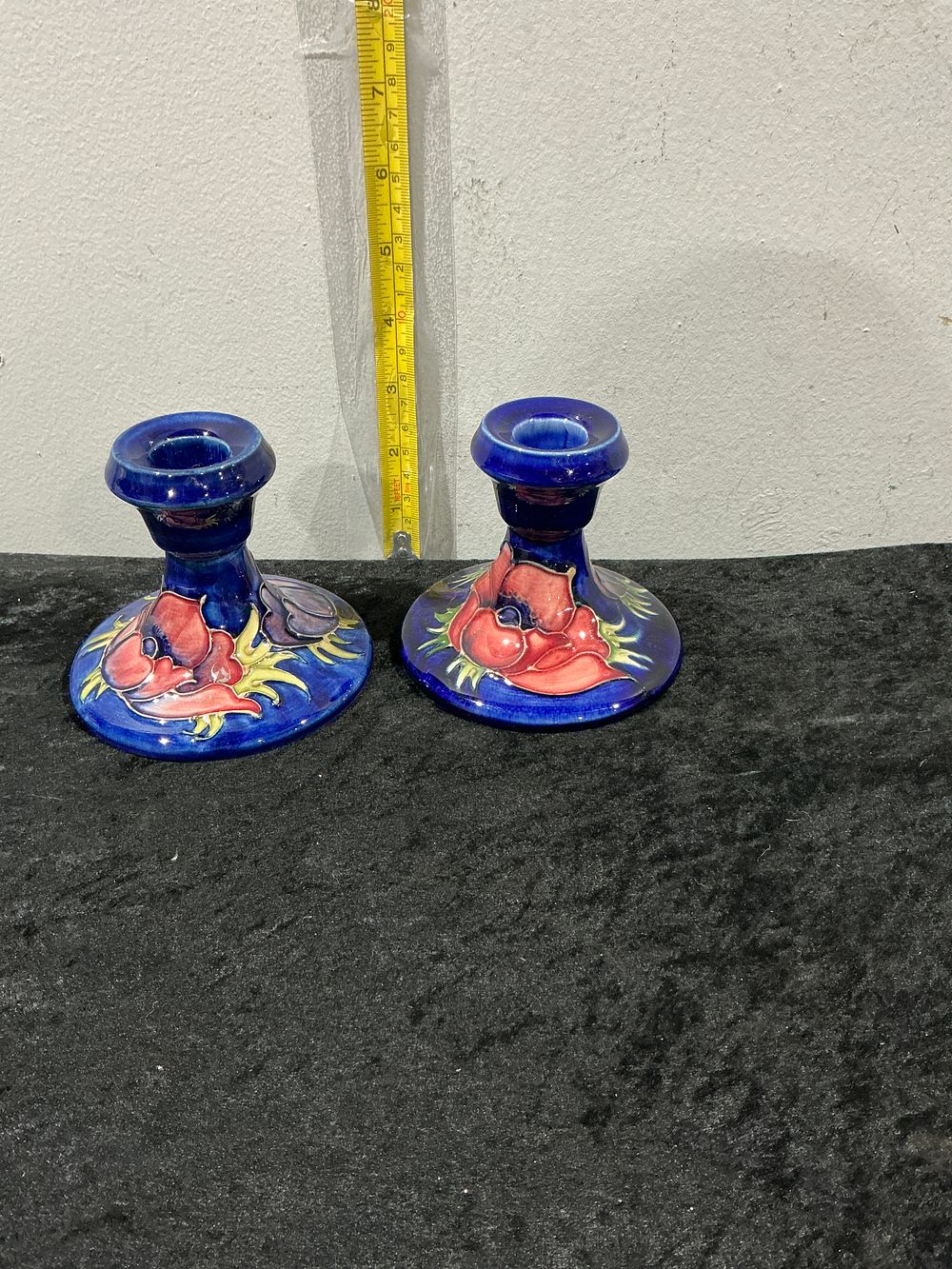 Lot 151: A Pair of Moorcroft Pottery Anemone Pattern Squat Candlesticks
Category: Ceramics