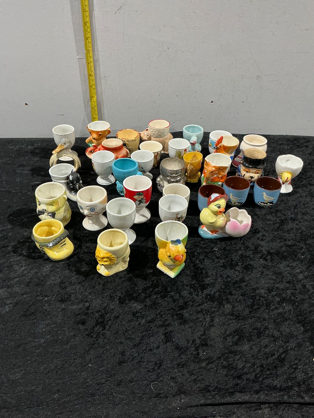Lot 159: A Large Collection of Novelty and Figural Ceramic Egg Cups, 20th Century
Category: Ceramics