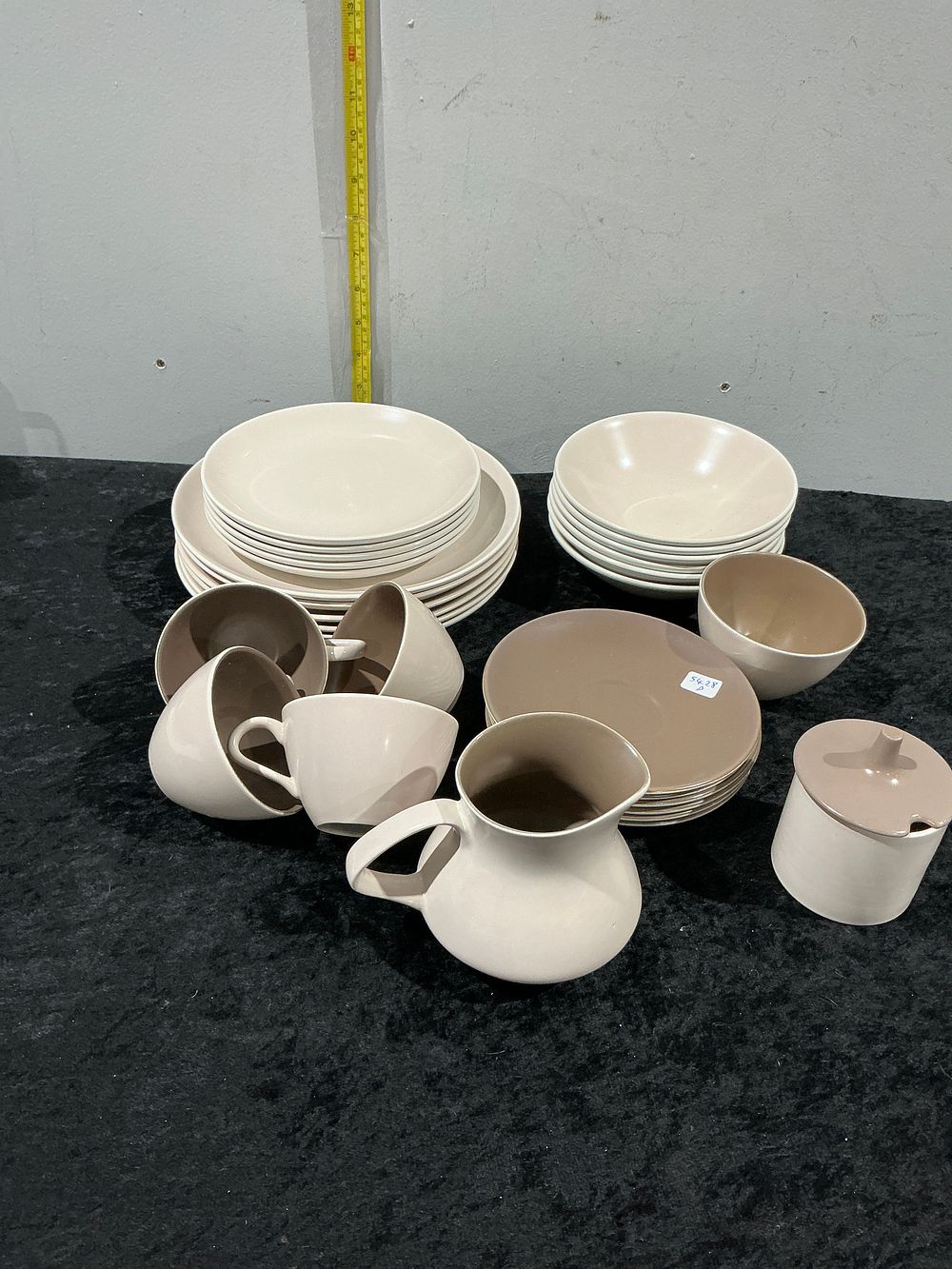 Lot 164: A Poole Pottery Twintone Mushroom and Sepia Pattern Breakfast and Tableware Set