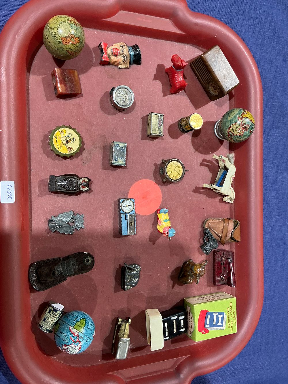 Lot 237: Collection of Vintage Figural and Novelty Pencil Sharpeners, Including Disney and Die-Cast Examples, Circa 1940-1970