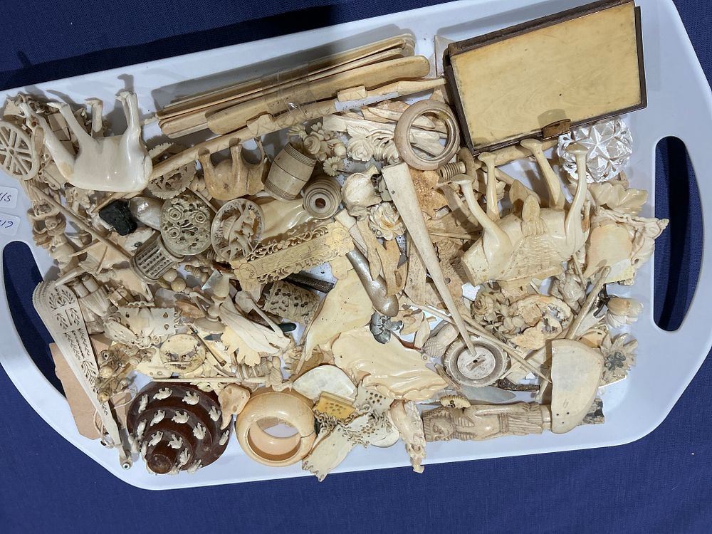 Lot 238: A large collection of miscellaneous carved bone smalls, figurines, and components for spares or repairs