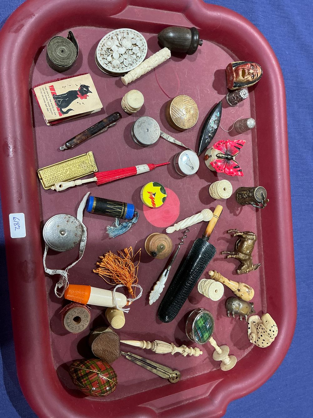 Lot 239: Victorian and Vintage Collection of Sewing Accessories, Carved Bone Curios, and Miniature Figurines, 19th to Mid-20th Century