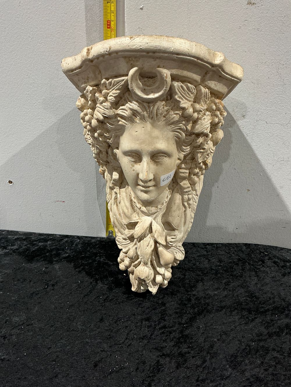 Lot 269: A Neoclassical Style Cast Plaster Architectural Wall Corbel Featuring the Goddess Diana